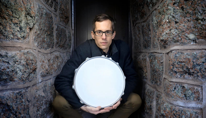 Matt Slocum holding a snare drum